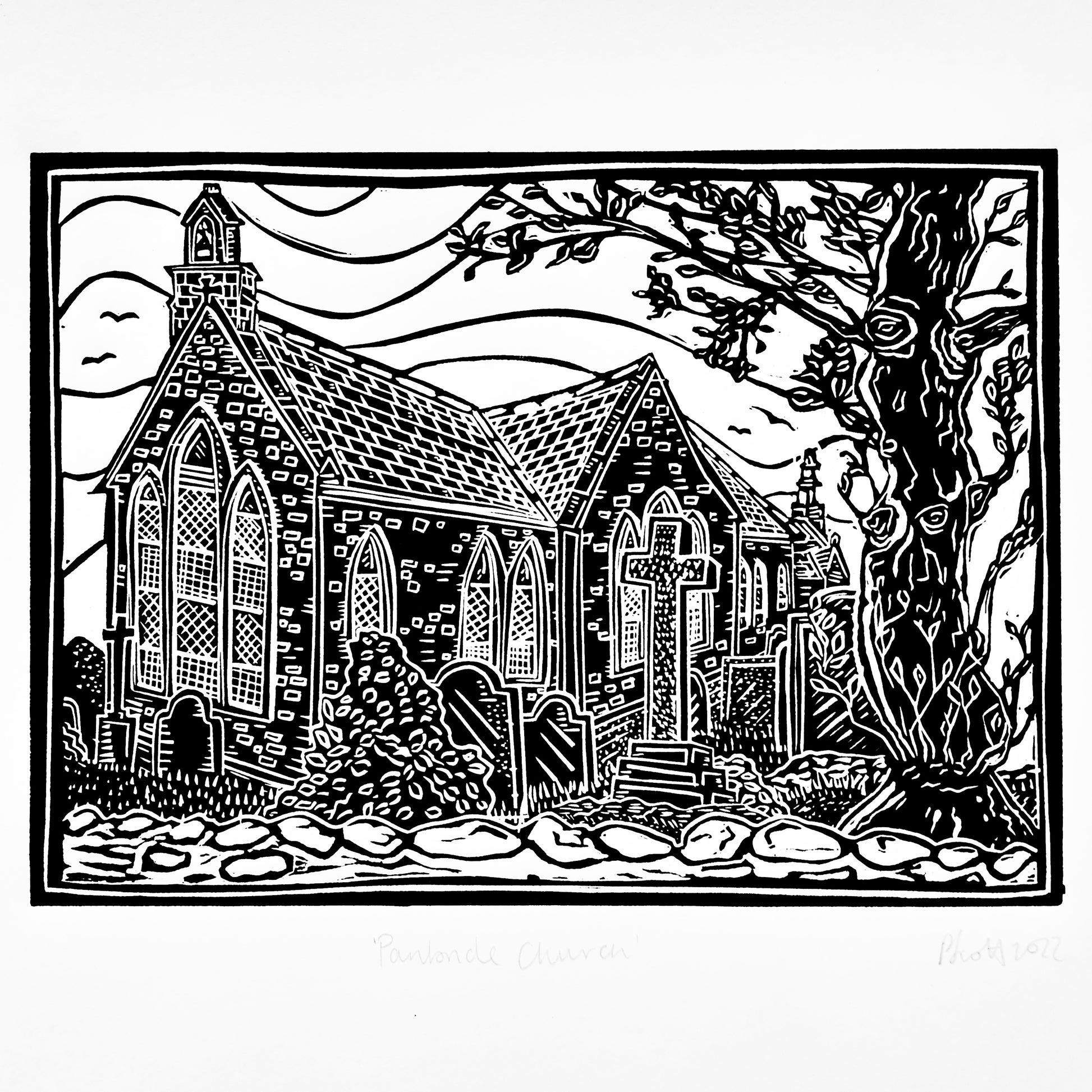 An original black and white linocut print by Pamela Scott depicting the quiet, historic Panbride Church in Carnoustie, mounted on antique white card.