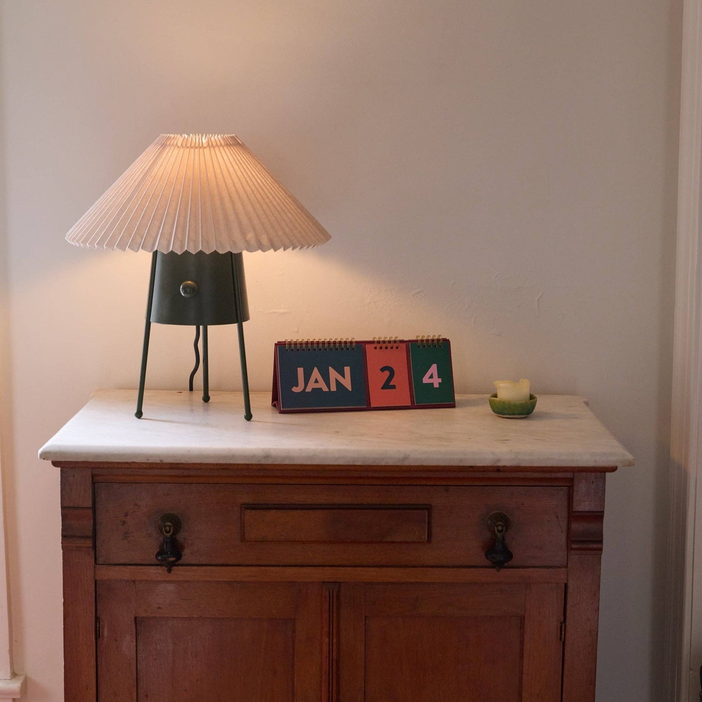 Designworks Ink Colourblock perpetual desk calendar with bold coloured pages and a freestanding A-frame design