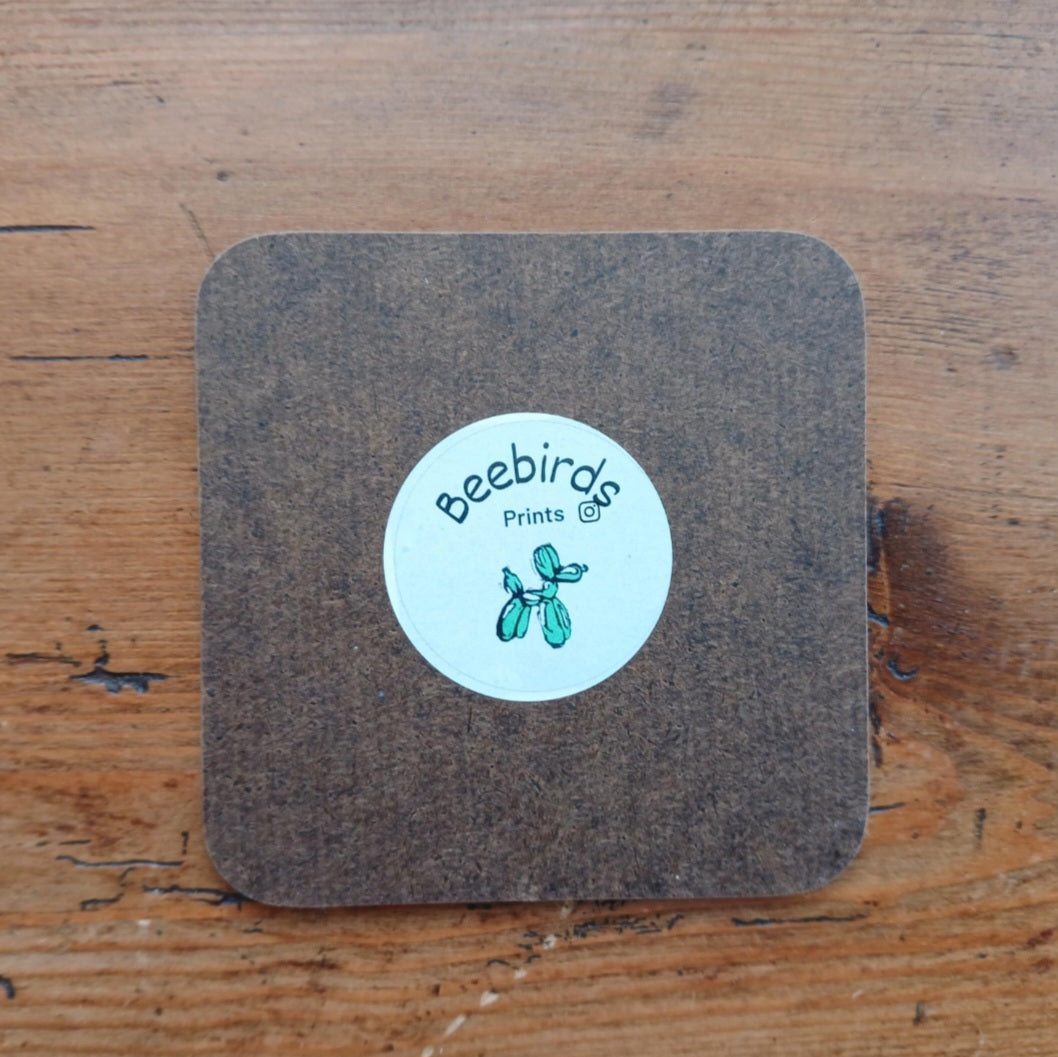 Rear of square hardwood coaster with Beebirds sticker