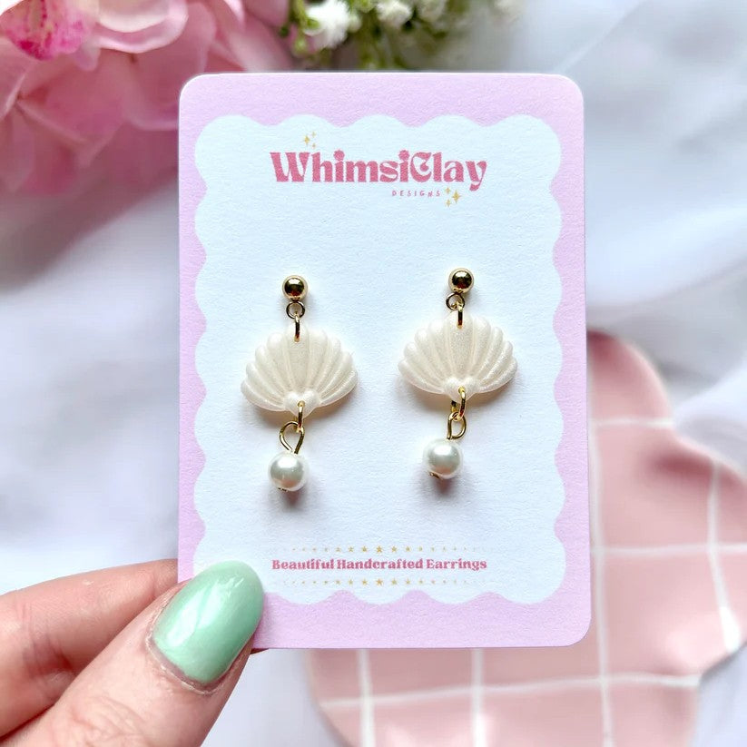 Polymer clay sea shell earrings in coastal tones with gold-plated posts, lightweight and perfect for beachy, summer style
