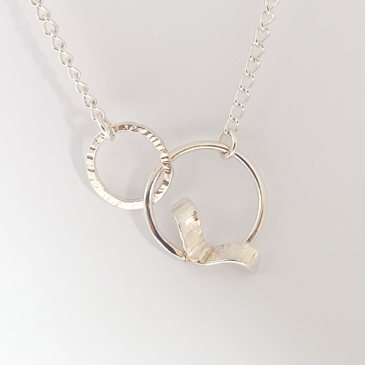 Sterling silver double hoop necklace with bird by Diana King handmade in Perthshire