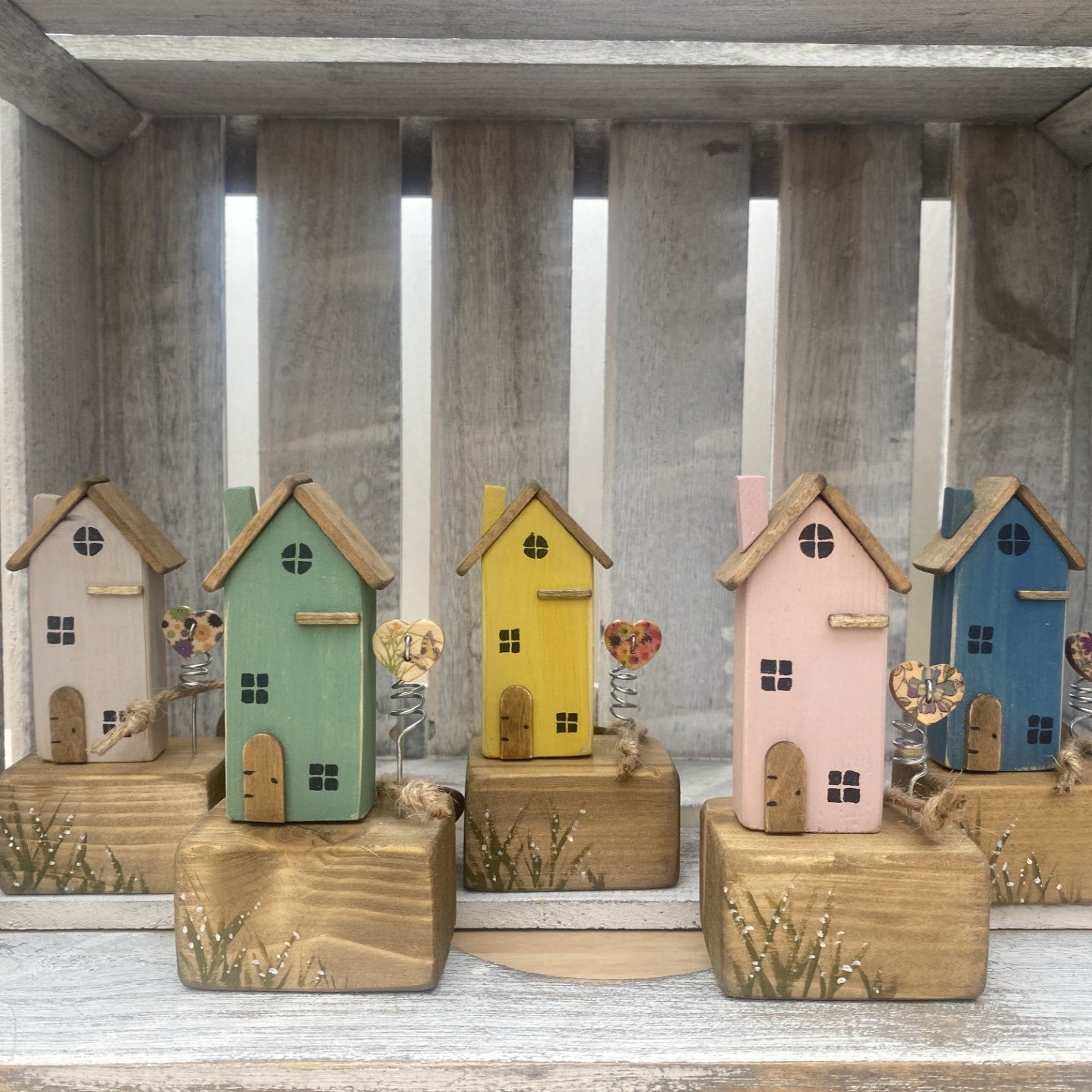 Handcrafted wooden house ornaments with spring heart and rustic metal details in Blue, Green, Mushroom, Pink or Yellow