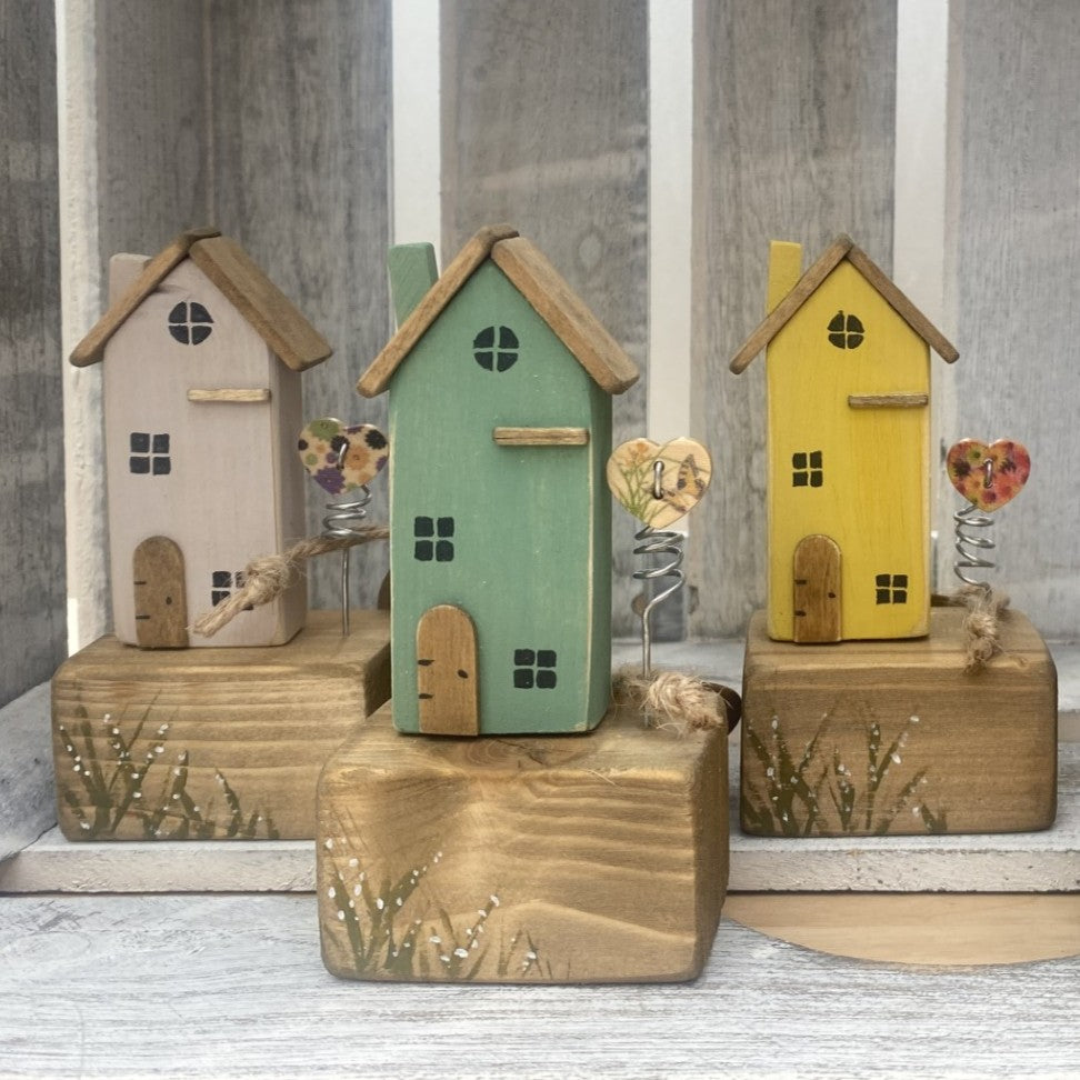 Handcrafted wooden house ornaments with spring heart and rustic metal details in Green, Mushroom or Yellow