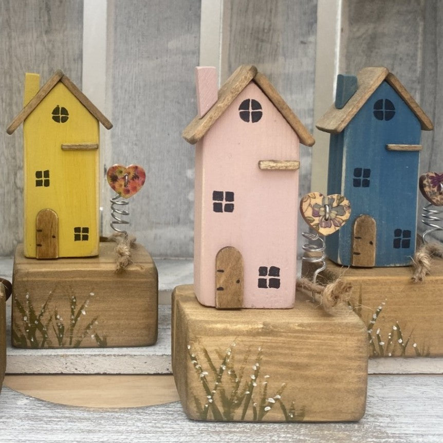 Handcrafted wooden house ornaments with spring heart and rustic metal details in Blue, Pink or Yellow