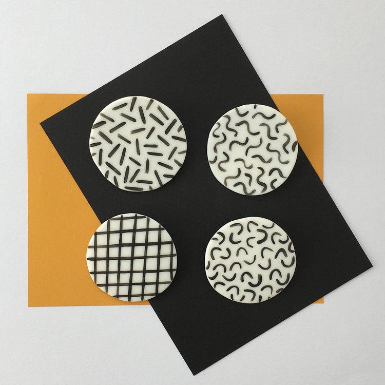 STAPLE BROOCH PIN GRID