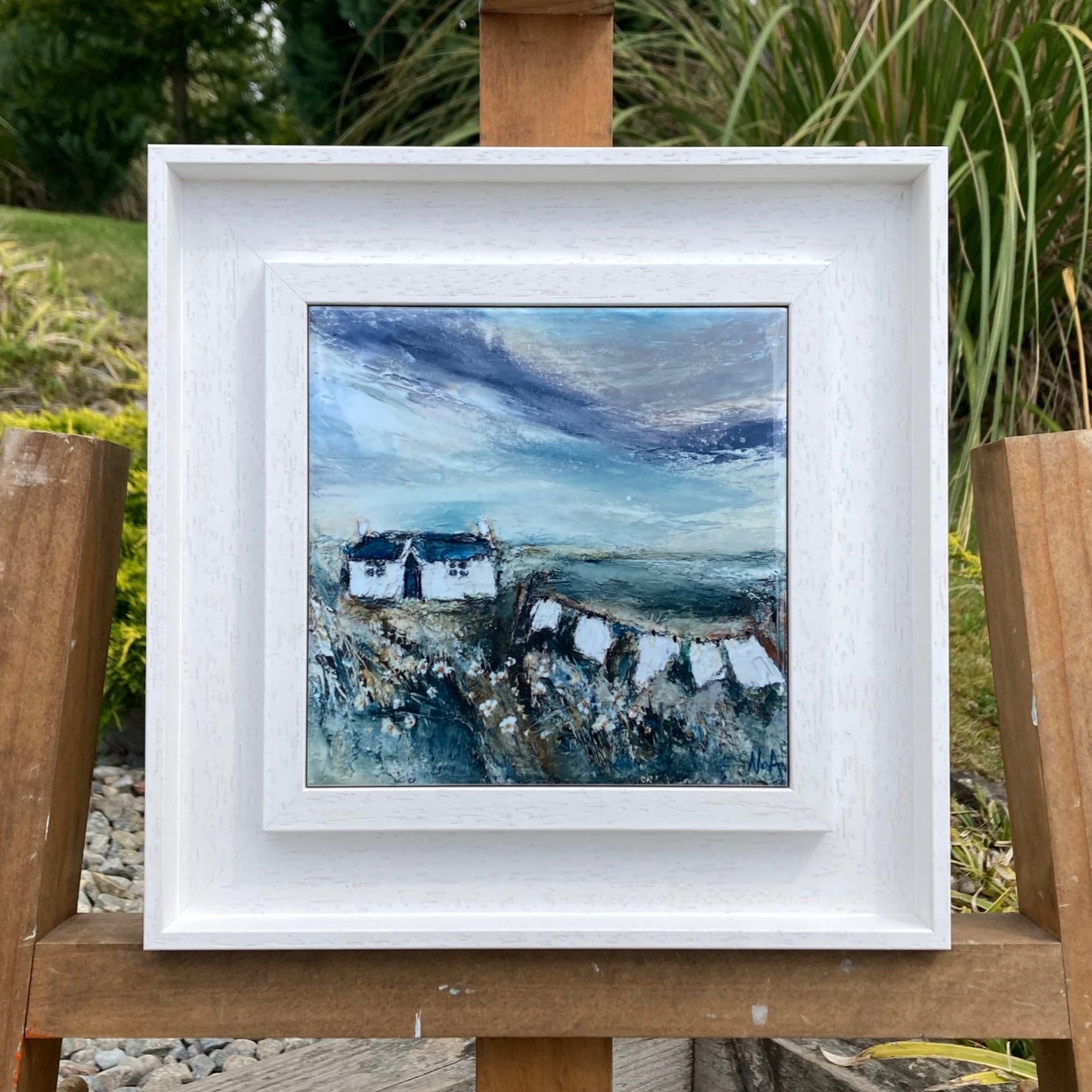 The Washing Line ceramic tile print by NOA Art, with white wood frame