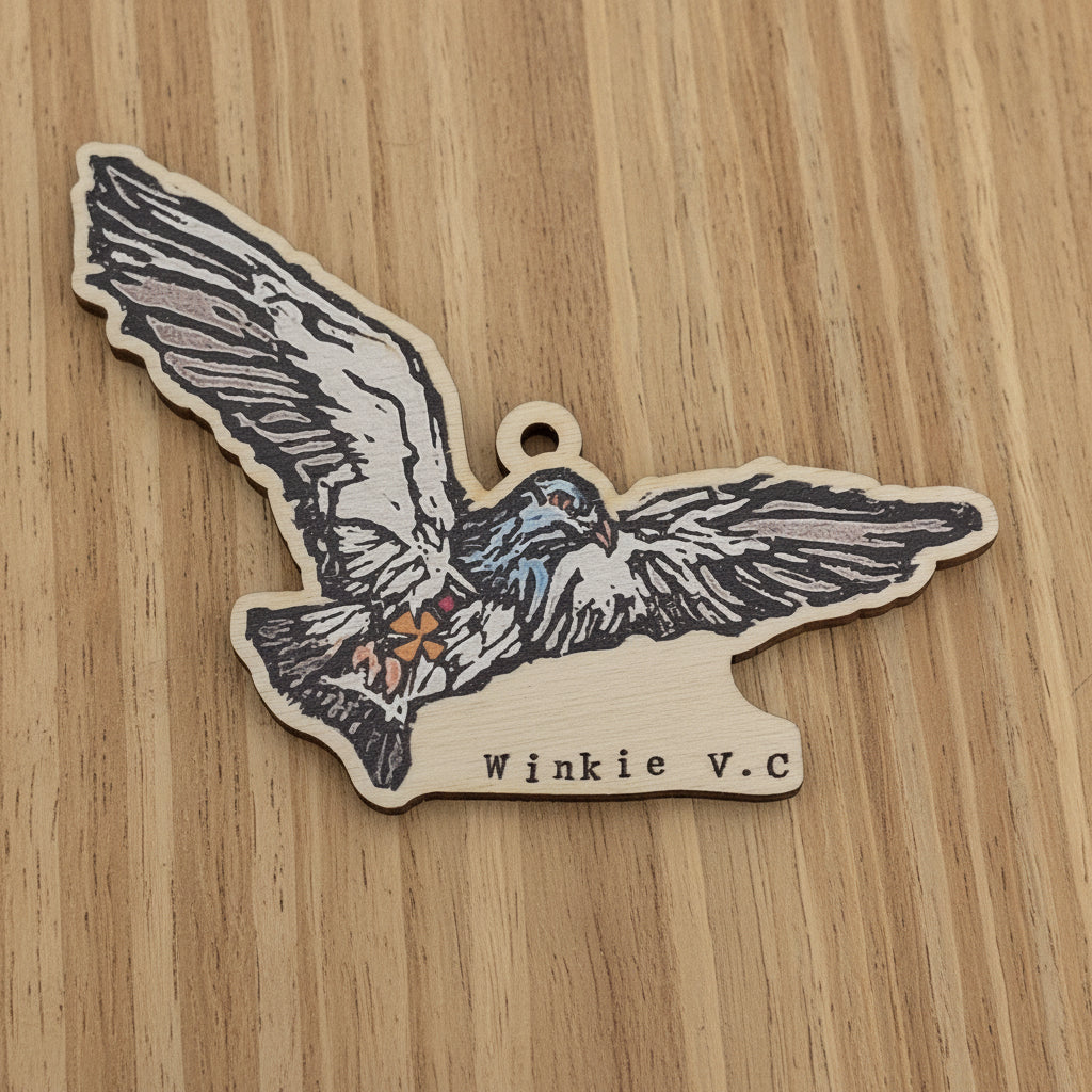 A wooden ornament featuring Winkie, the heroic Broughty Ferry RAF carrier pigeon during World War II who became the very first recipient of the Dickin Medal