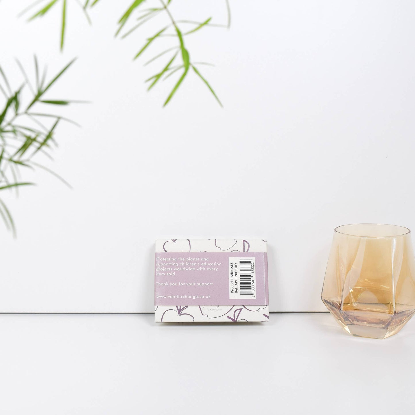 Recycled sticky notes pad in pink with Orchard Notes debossed cover and three sizes of biodegradable sticky notes