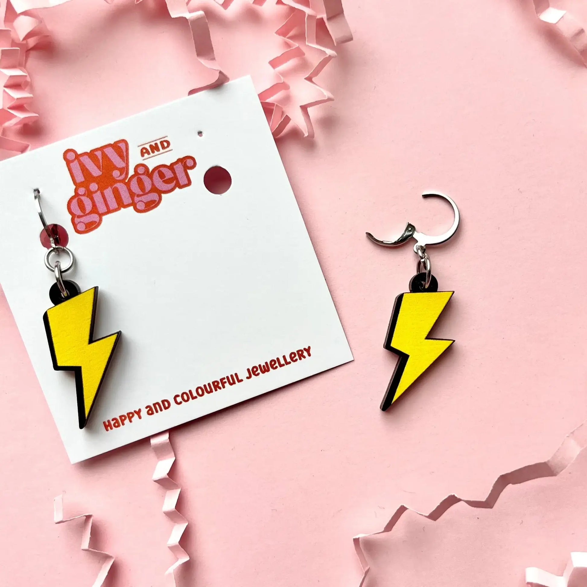 Bright lightning bolt dangle earrings, FSC wood, digital print, lightweight 45mm drop, surgical steel huggie hoops for sensitive ears.