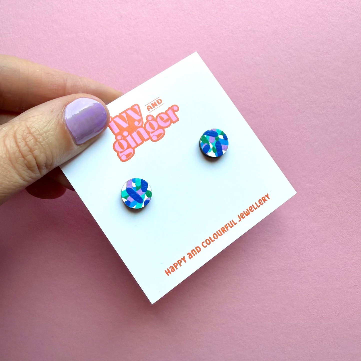 Hand painted confetti circle wooden stud earrings, FSC wood, 10mm, surgical steel posts, colourful, lightweight, gift-ready.
