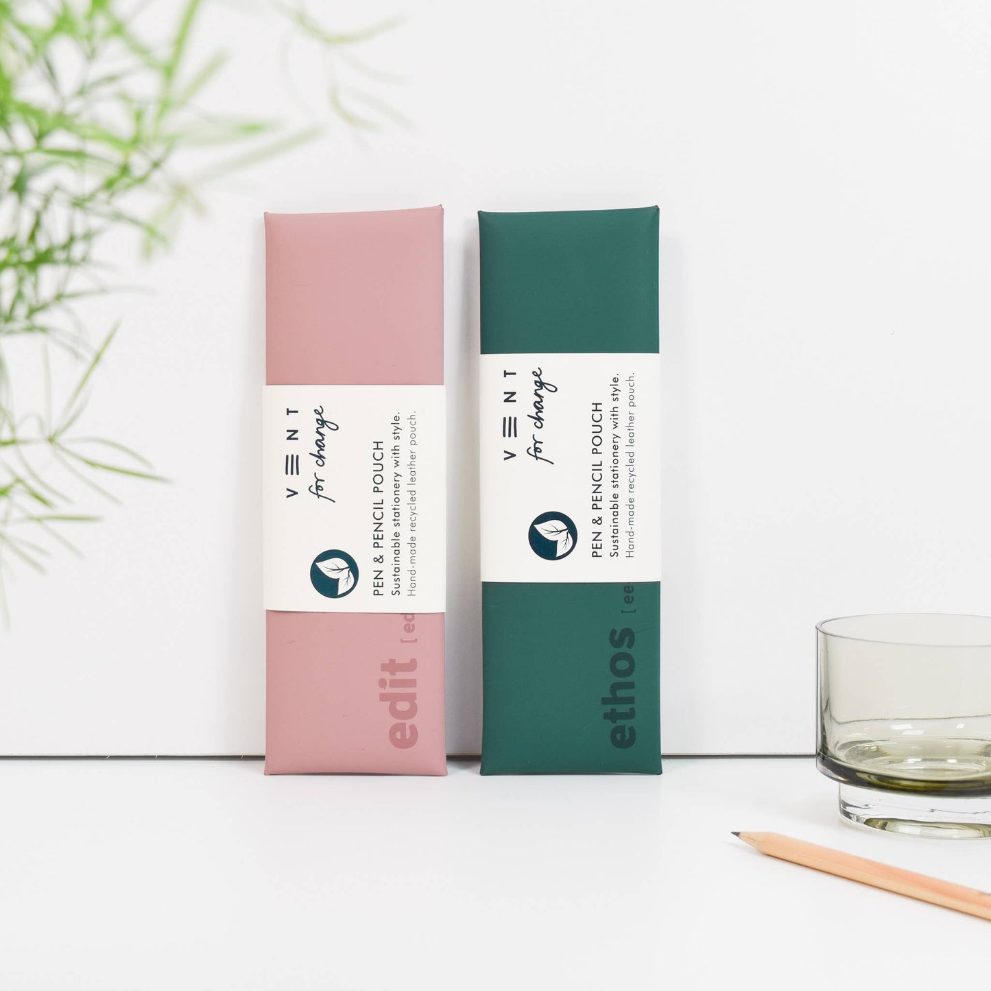Handmade recycled leather pencil pouch debossed with EDIT or ETHOS design, in rich green or soft pink, stylish and sustainable accessory