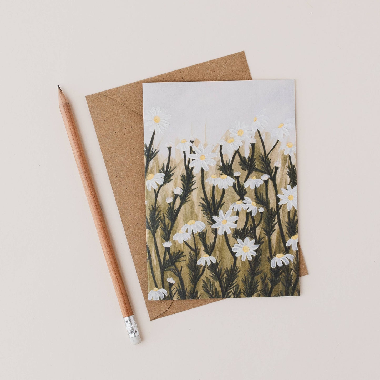 Luxury A6 floral greetings card with mixed media field of daisies illustration, blank inside, recycled Kraft envelope, printed on 350gsm UK card