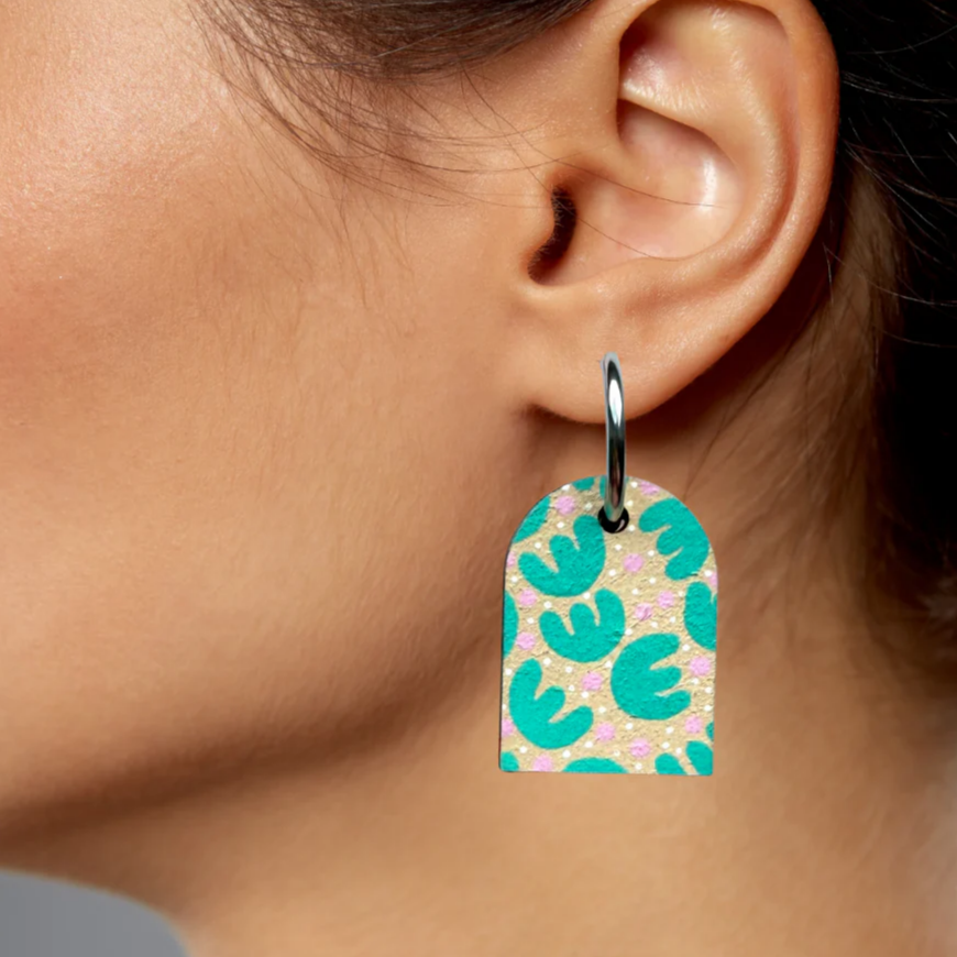 Hand-painted dangle hoop earrings with a tropical retro print
