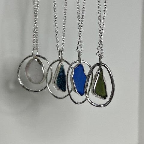 Sterling silver sea glass pendant necklaces handmade in Dundee with teardrop or circle design