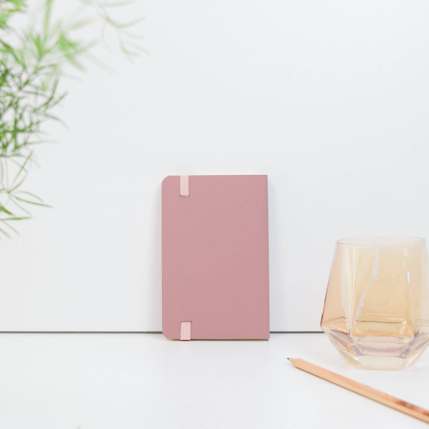 A6 recycled leather pocket notebook with elastic closure in pink