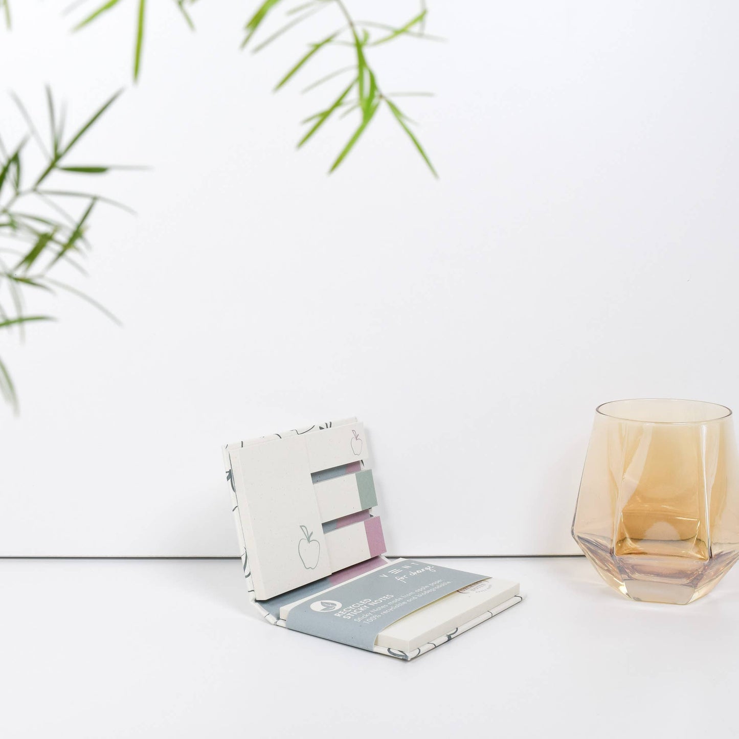 Recycled sticky notes pad in green with Orchard Notes debossed cover and three sizes of biodegradable sticky notes