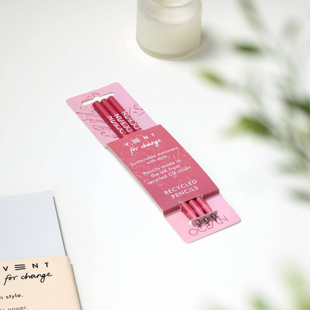 Pack of three OCEAN recycled graphite pencils in red sleeve, made from CD cases with embossed design