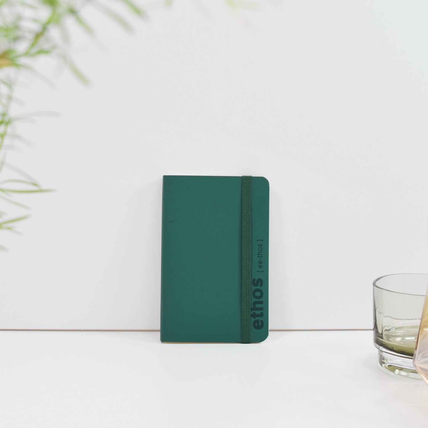 A6 recycled leather pocket notebook with elastic closure in green