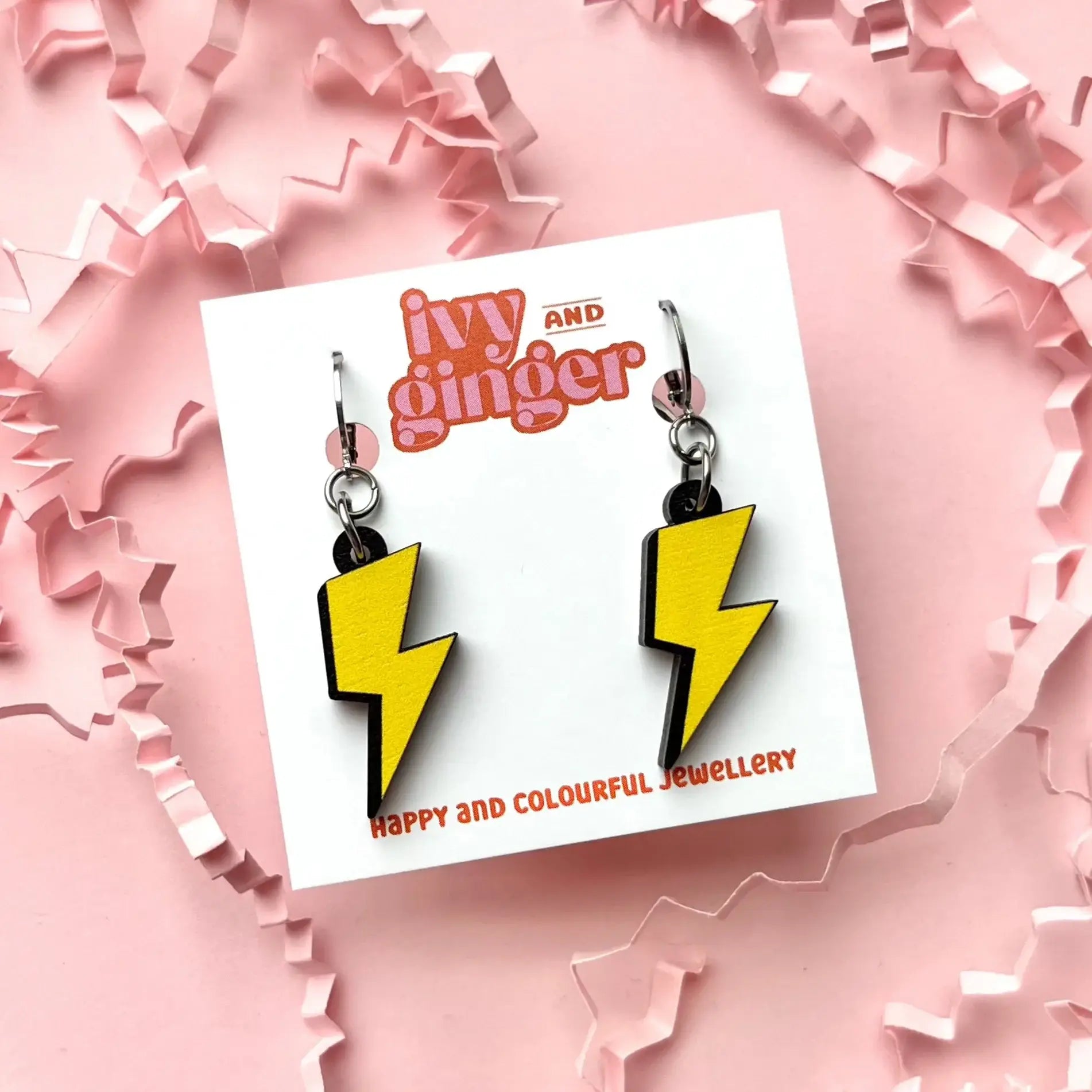 Bright lightning bolt dangle earrings, FSC wood, digital print, lightweight 45mm drop, surgical steel huggie hoops for sensitive ears.