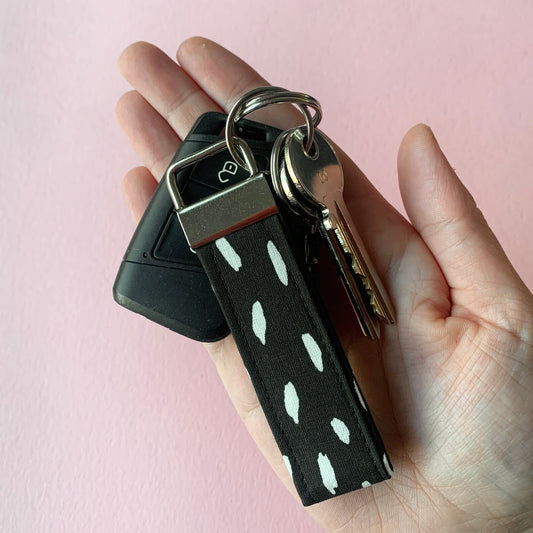 Handmade mini cotton key fob with silver hardware, assorted fabric designs