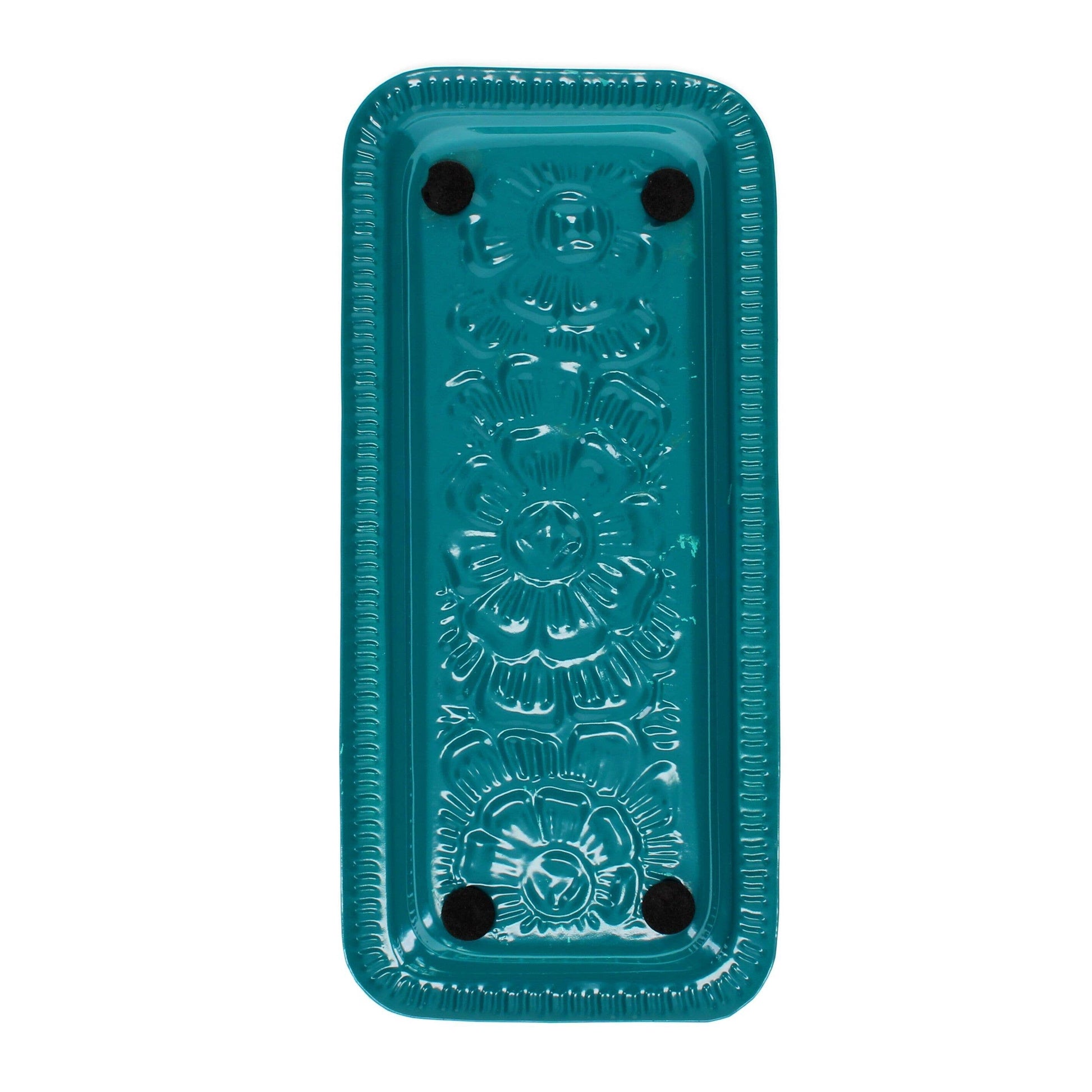 Rectangular teal blue enamel cast metal tray with floral centre and line border, foam pads on base