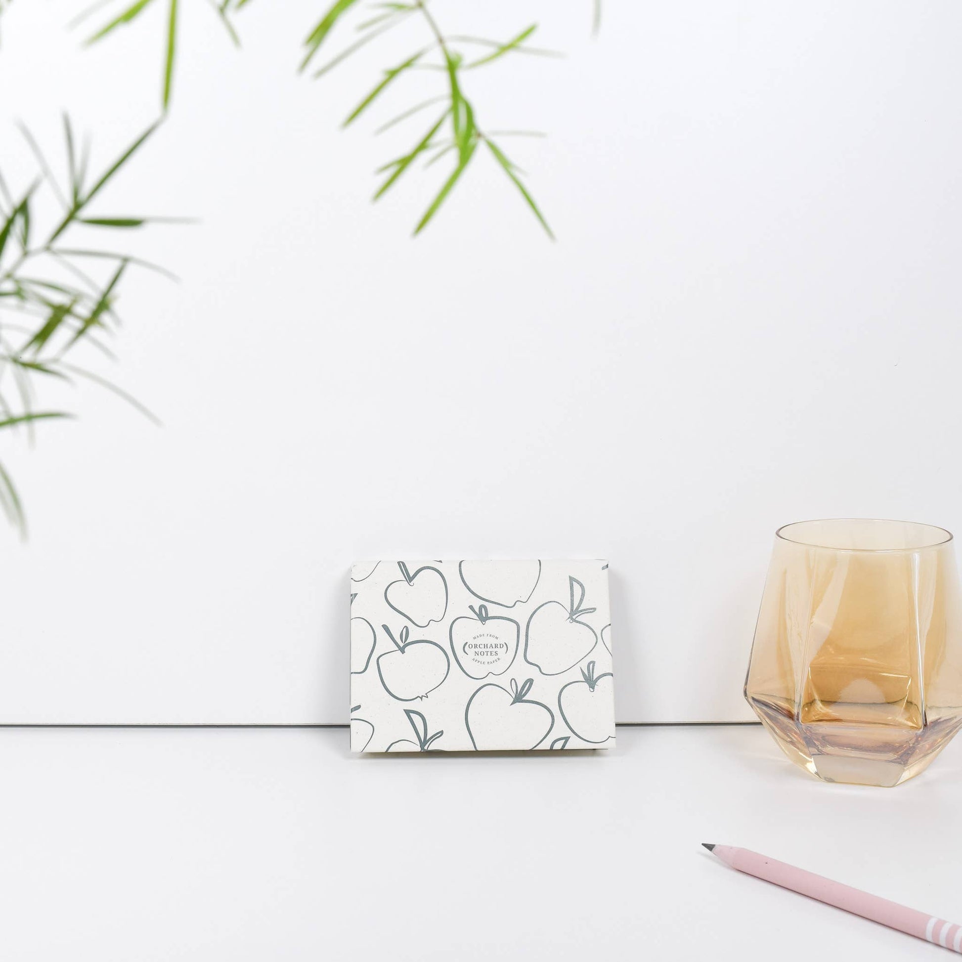Recycled sticky notes pad in green with Orchard Notes debossed cover and three sizes of biodegradable sticky notes
