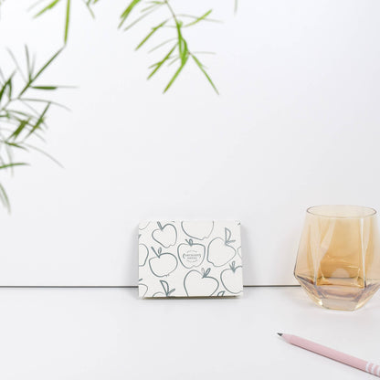 Recycled sticky notes pad in green with Orchard Notes debossed cover and three sizes of biodegradable sticky notes