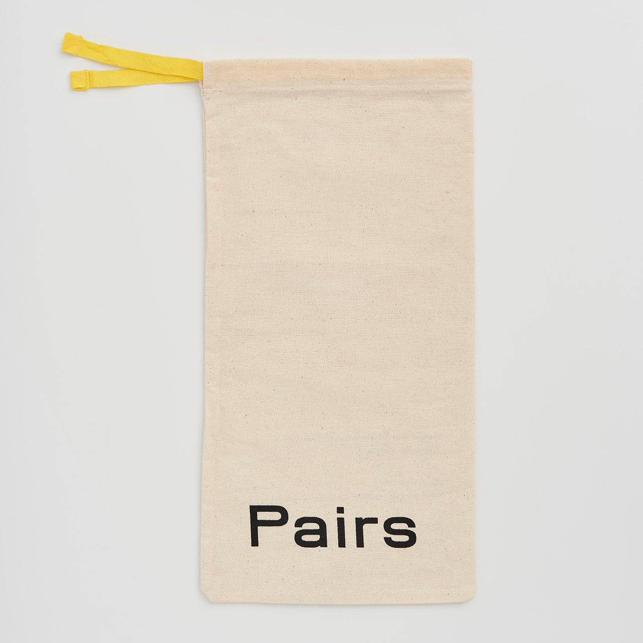 PAIRS Cream cotton dustbag with yellow drawstring 