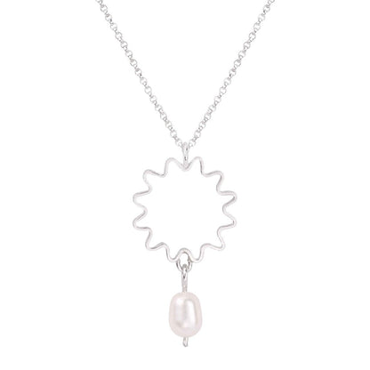 Mini Ondulée pearl pendant necklace with small delicate drop pearl, matching studs, and hoops for versatile styling.
