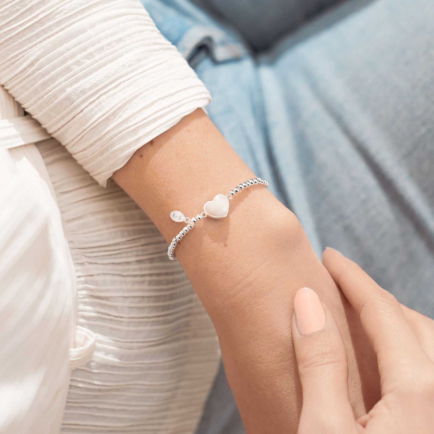 A LITTLE 'MARVELLOUS MUM' SILVER BRACELET