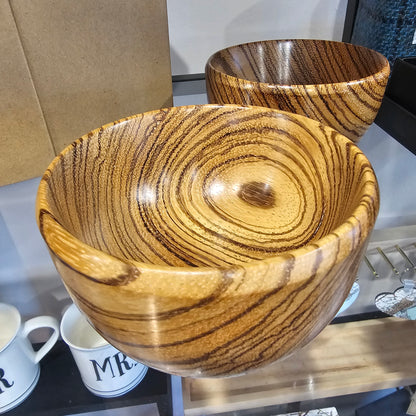 Beautifully handcrafted wooden bowl with unique grain and character