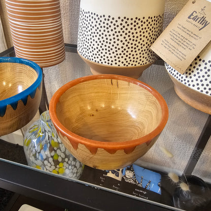 Beautifully handcrafted wooden bowl with unique grain, character and resin rim