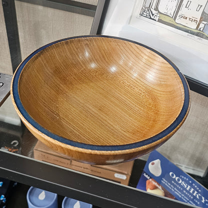 Beautifully handcrafted wooden bowl with unique grain, character and resin inlay
