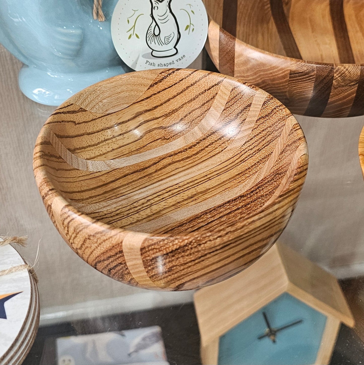 Beautifully handcrafted wooden bowl with unique grain, character adn striped detail