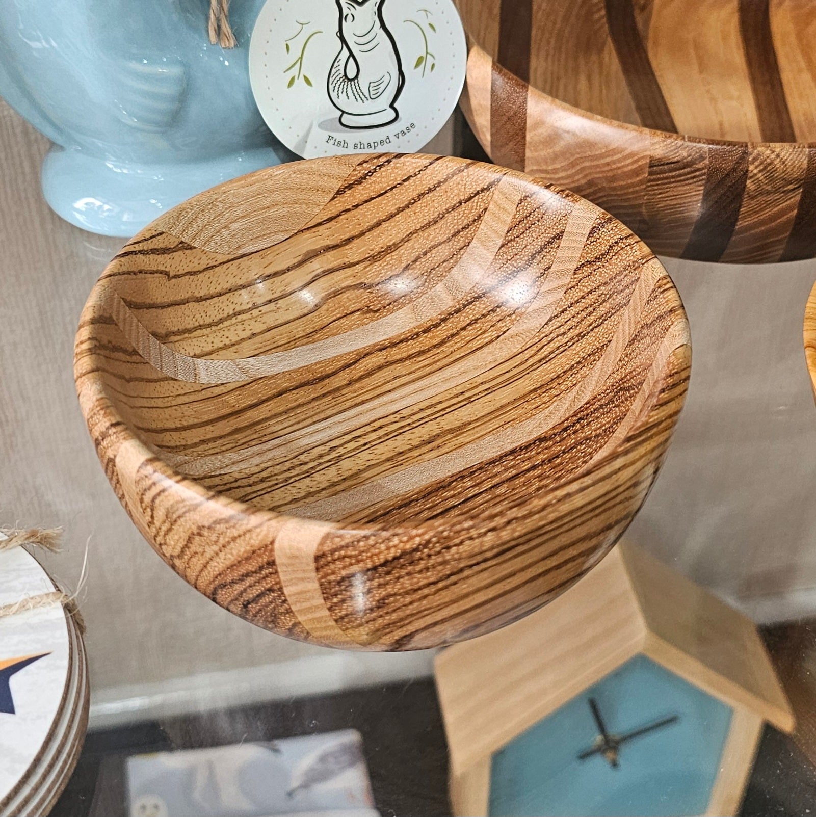 Beautifully handcrafted wooden bowl with unique grain, character adn striped detail