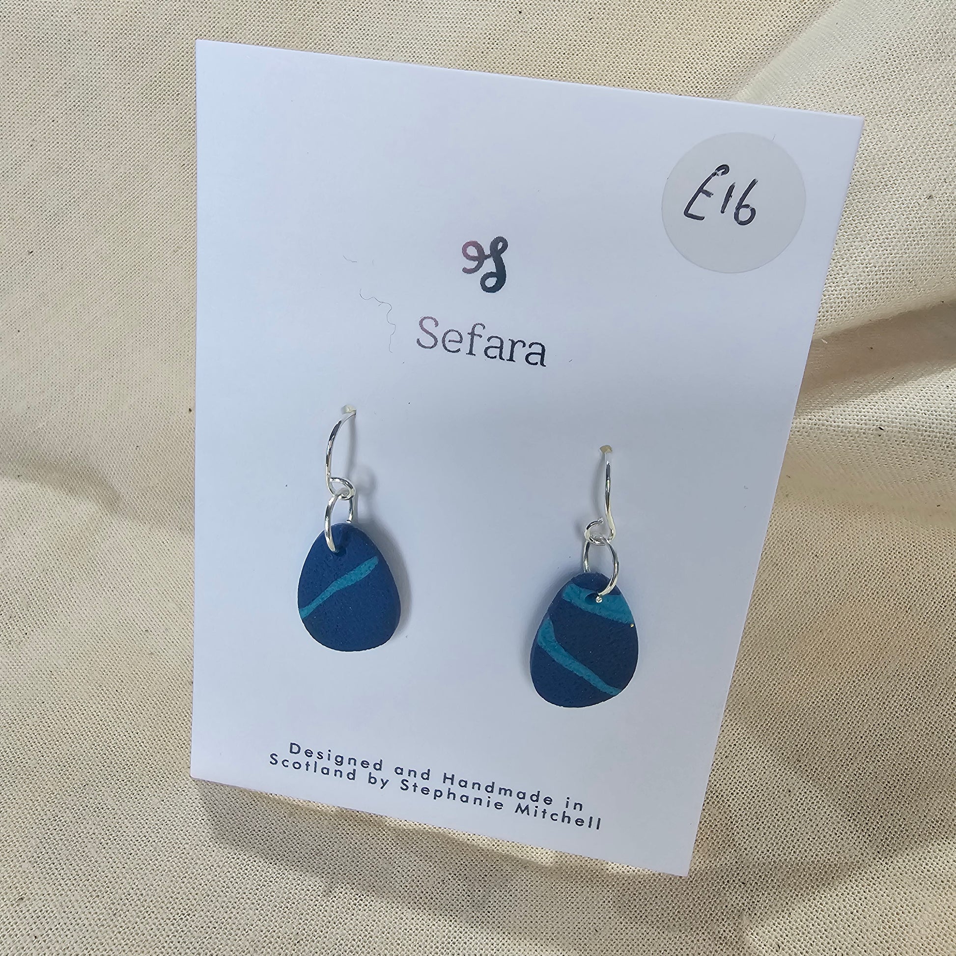 Pair of handmade polymer clay hook earrings – lightweight blue striped design by Sefara Jewellery