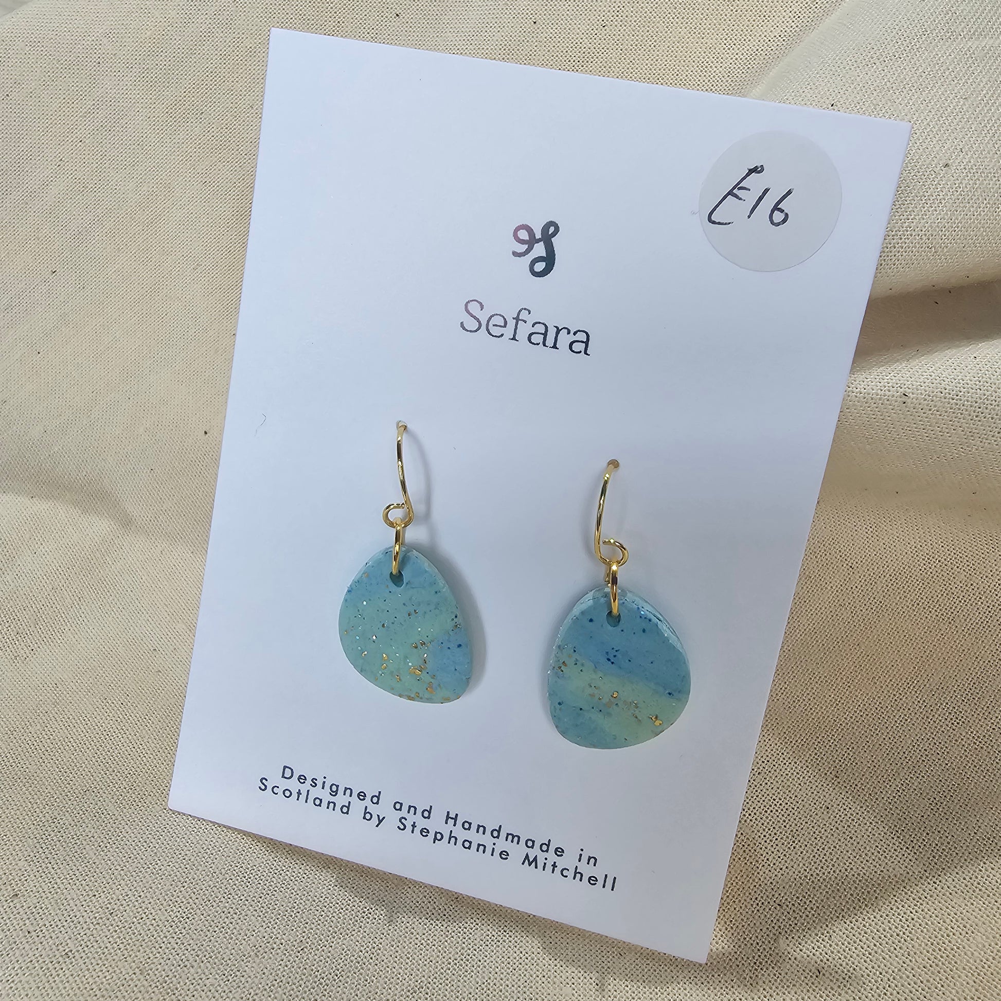 Pair of handmade polymer clay hook earrings – lightweight aqua sparkle design by Sefara Jewellery