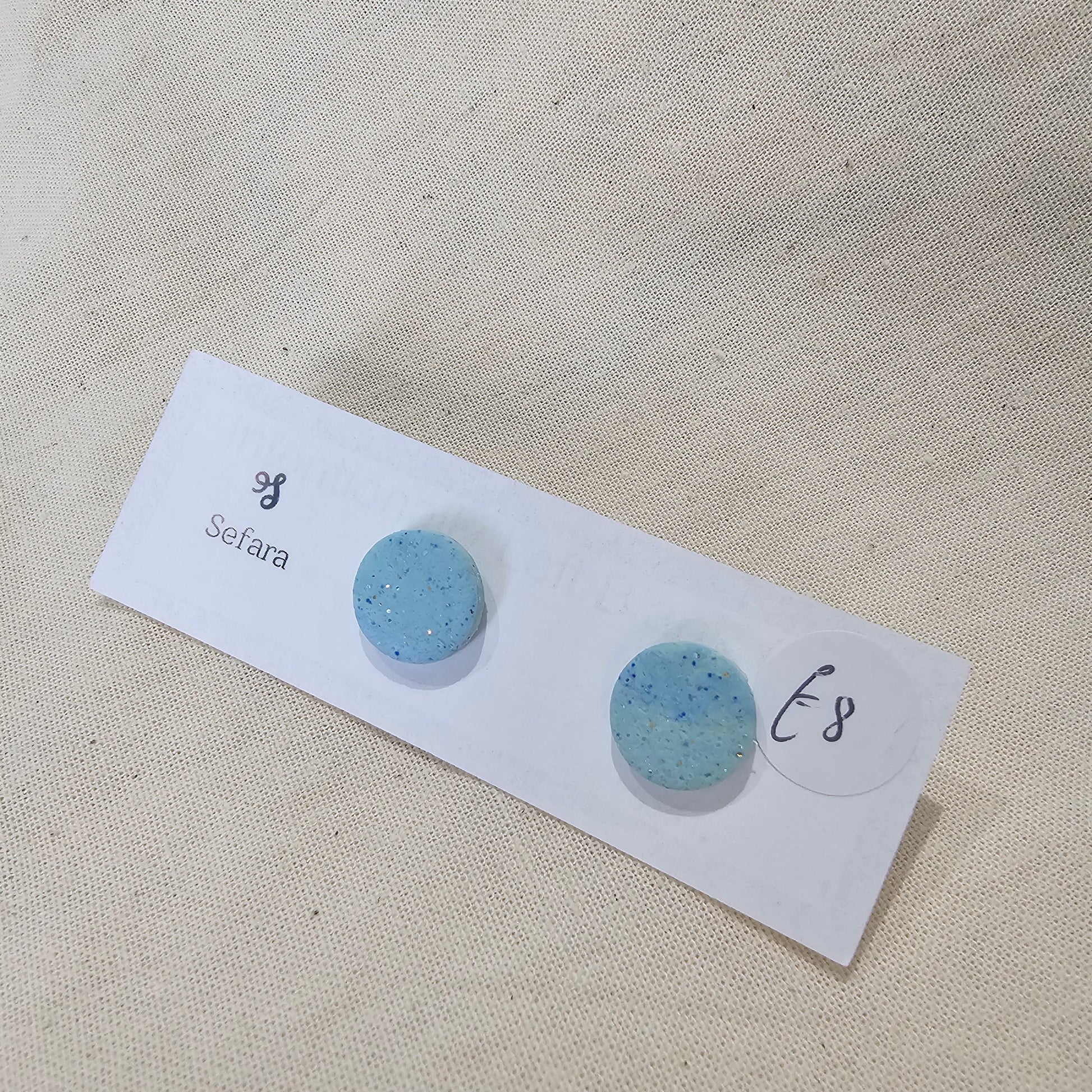 Handmade polymer stud earrings – lightweight mint sparkle design by Sefara Jewellery
