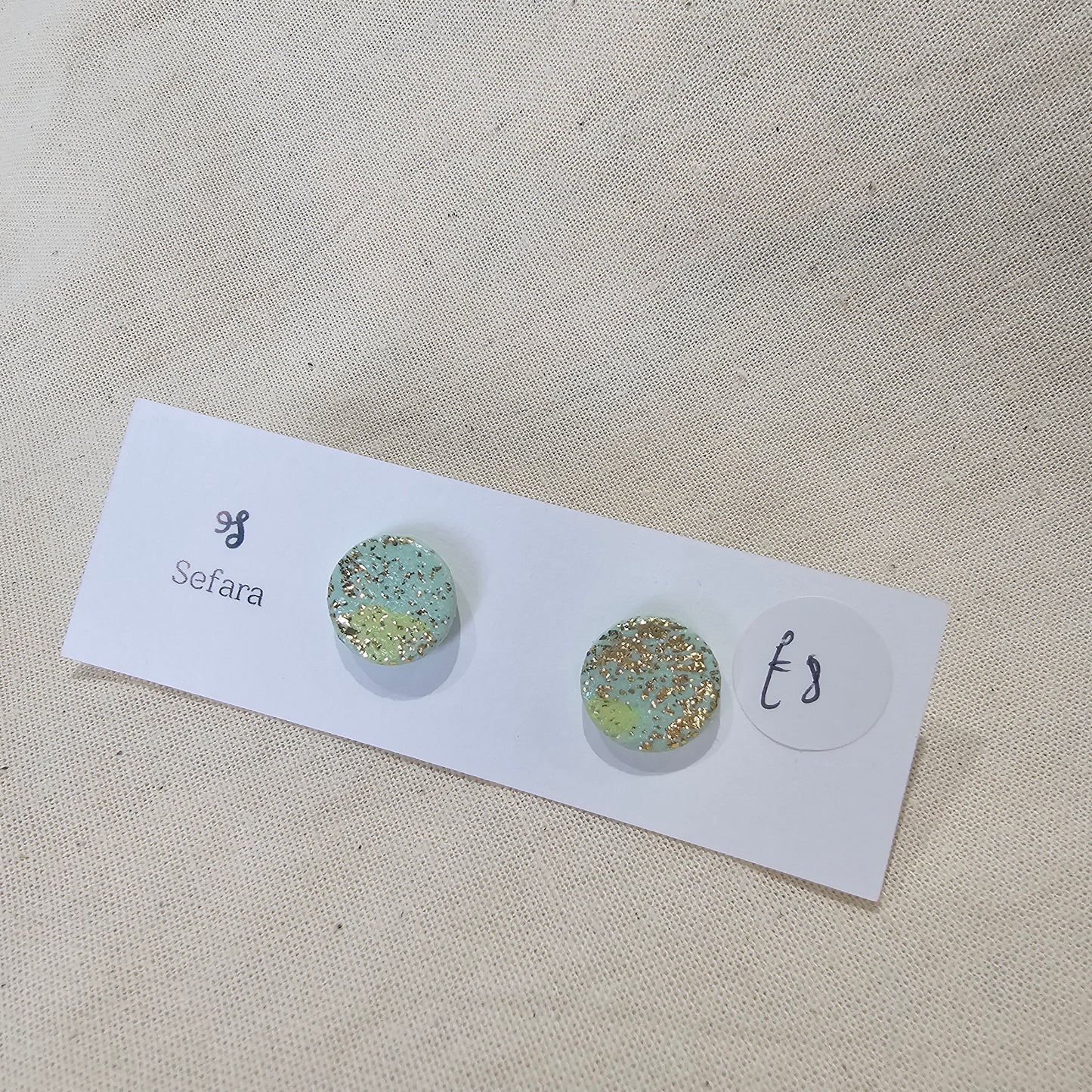 Handmade polymer stud earrings – lightweight aqua sparkle design by Sefara Jewellery