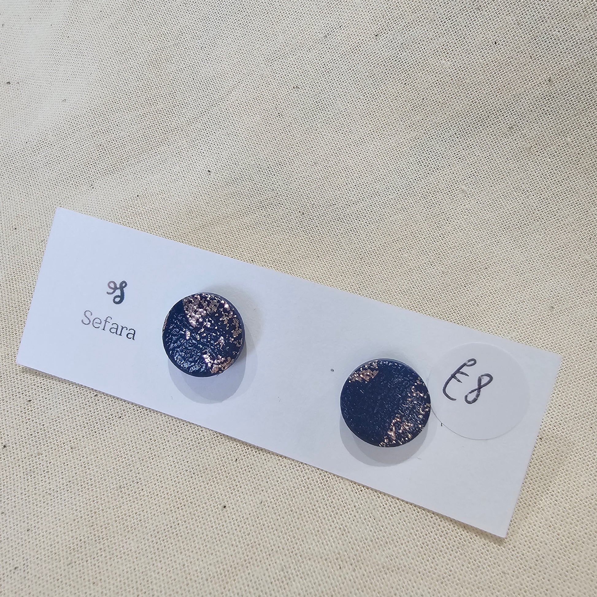 Handmade polymer stud earrings – lightweight navy and bronze design by Sefara Jewellery