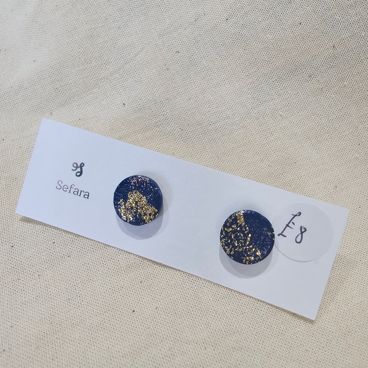 Handmade polymer stud earrings – lightweight navy bronze and gold design by Sefara Jewellery