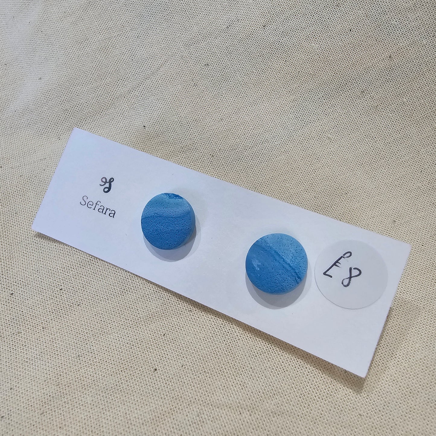 Handmade polymer stud earrings – lightweight sea blue design by Sefara Jewellery