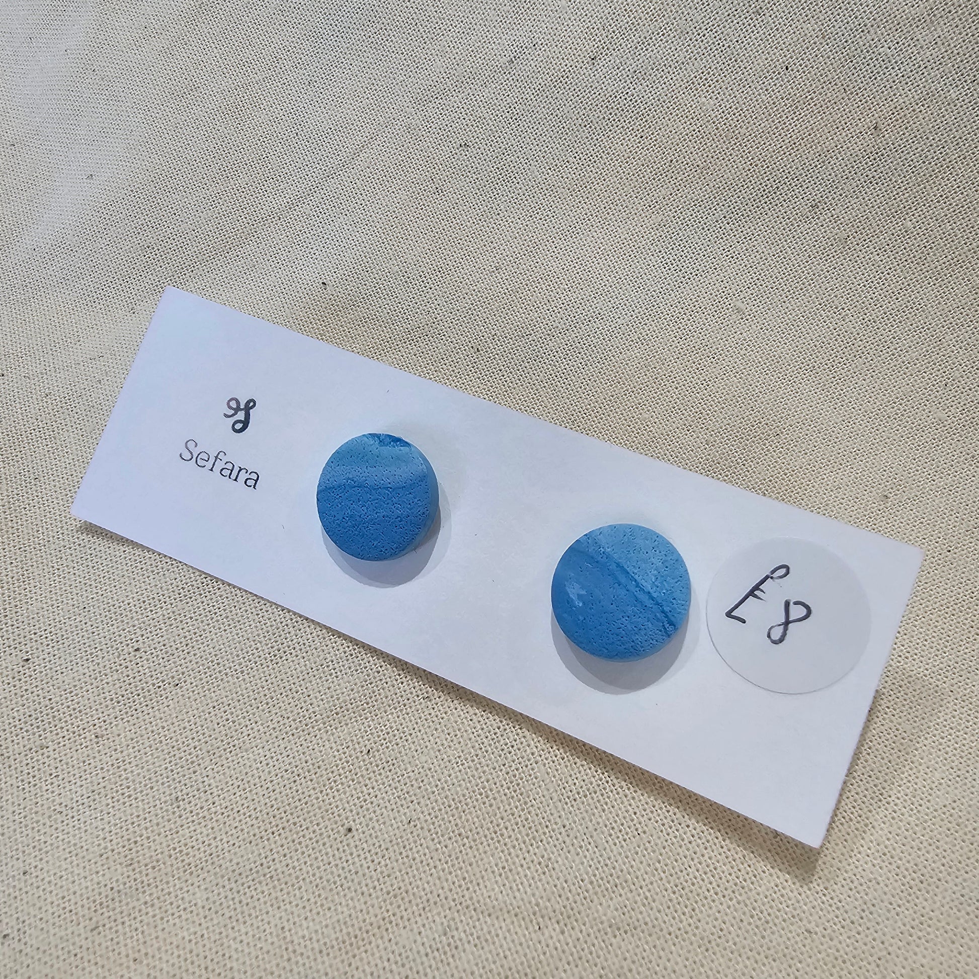 Handmade polymer stud earrings – lightweight sea blue design by Sefara Jewellery