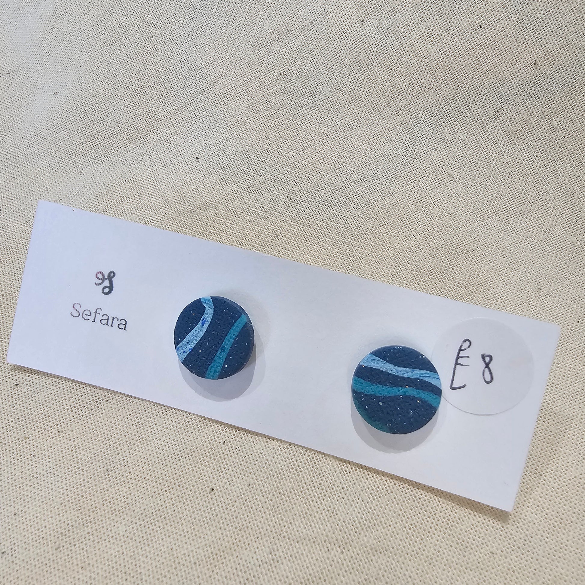 Handmade polymer stud earrings – lightweight blue striped design by Sefara Jewellery