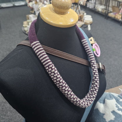 Handmade Scottish lambswool knitted necklace in soft looped design, shown on mannequin highlighting texture and craftsmanship.