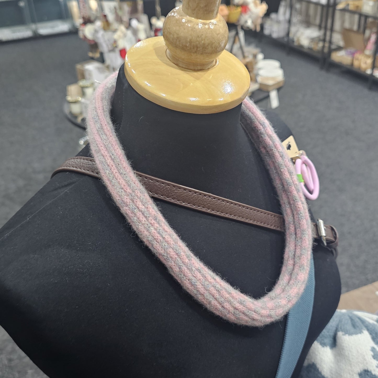 Handmade Scottish lambswool knitted necklace in soft looped design, shown on mannequin highlighting texture and craftsmanship.