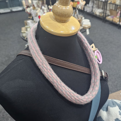 Handmade Scottish lambswool knitted necklace in soft looped design, shown on mannequin highlighting texture and craftsmanship.