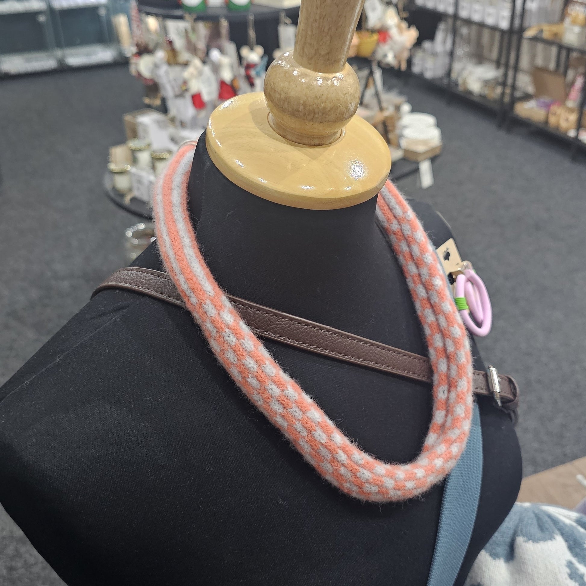 Handmade Scottish lambswool knitted necklace in soft looped design, shown on mannequin highlighting texture and craftsmanship.