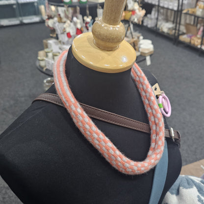 Handmade Scottish lambswool knitted necklace in soft looped design, shown on mannequin highlighting texture and craftsmanship.