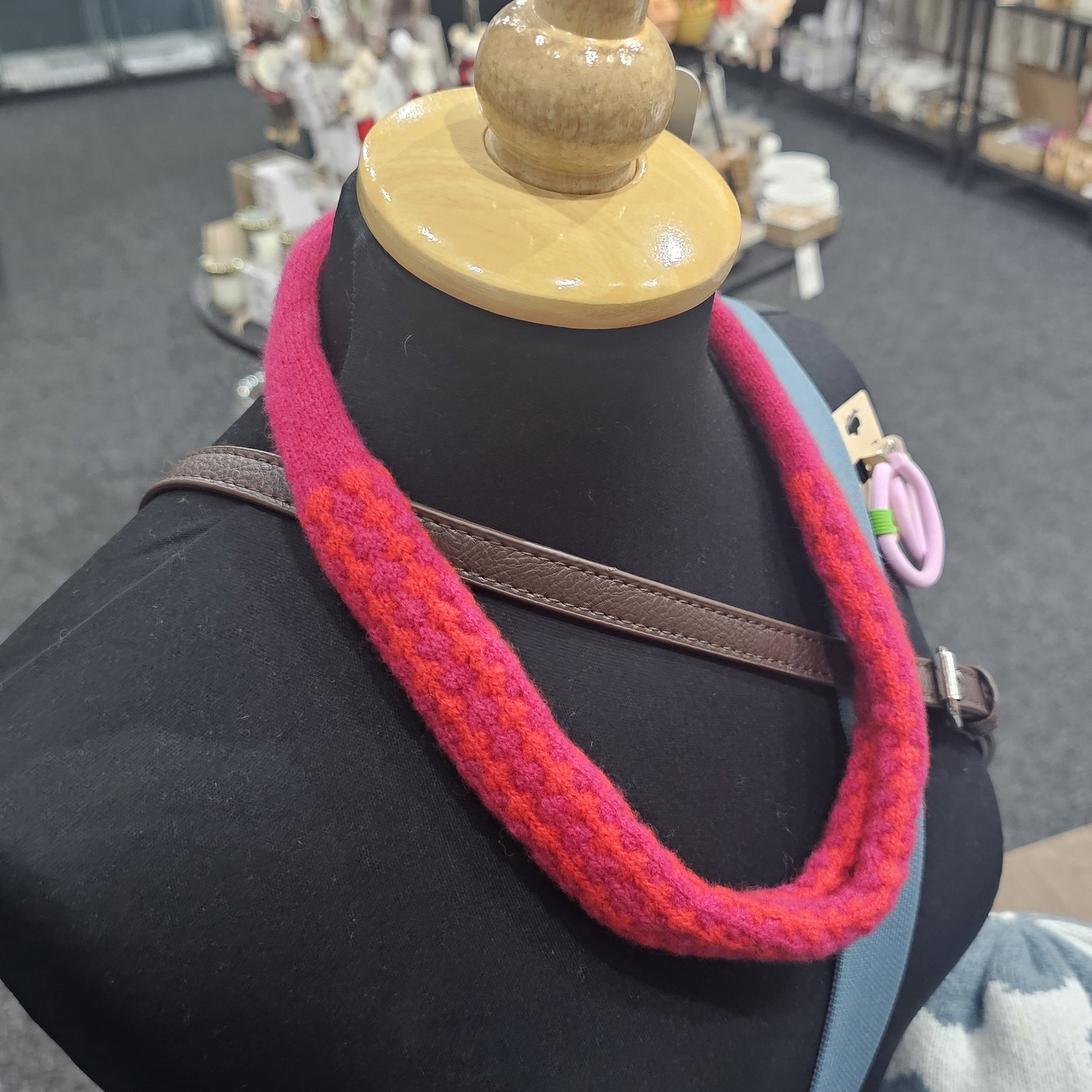 Handmade Scottish lambswool knitted necklace in soft looped design, shown on mannequin highlighting texture and craftsmanship.